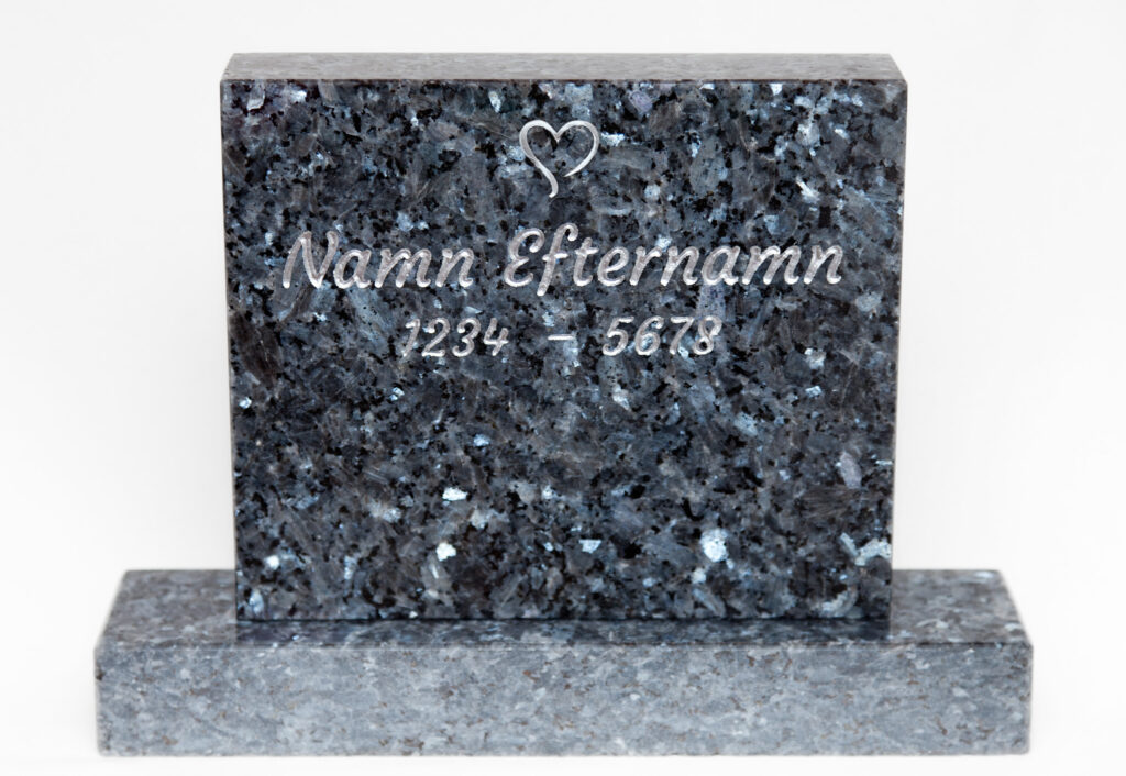 Stående låg bred gravsten